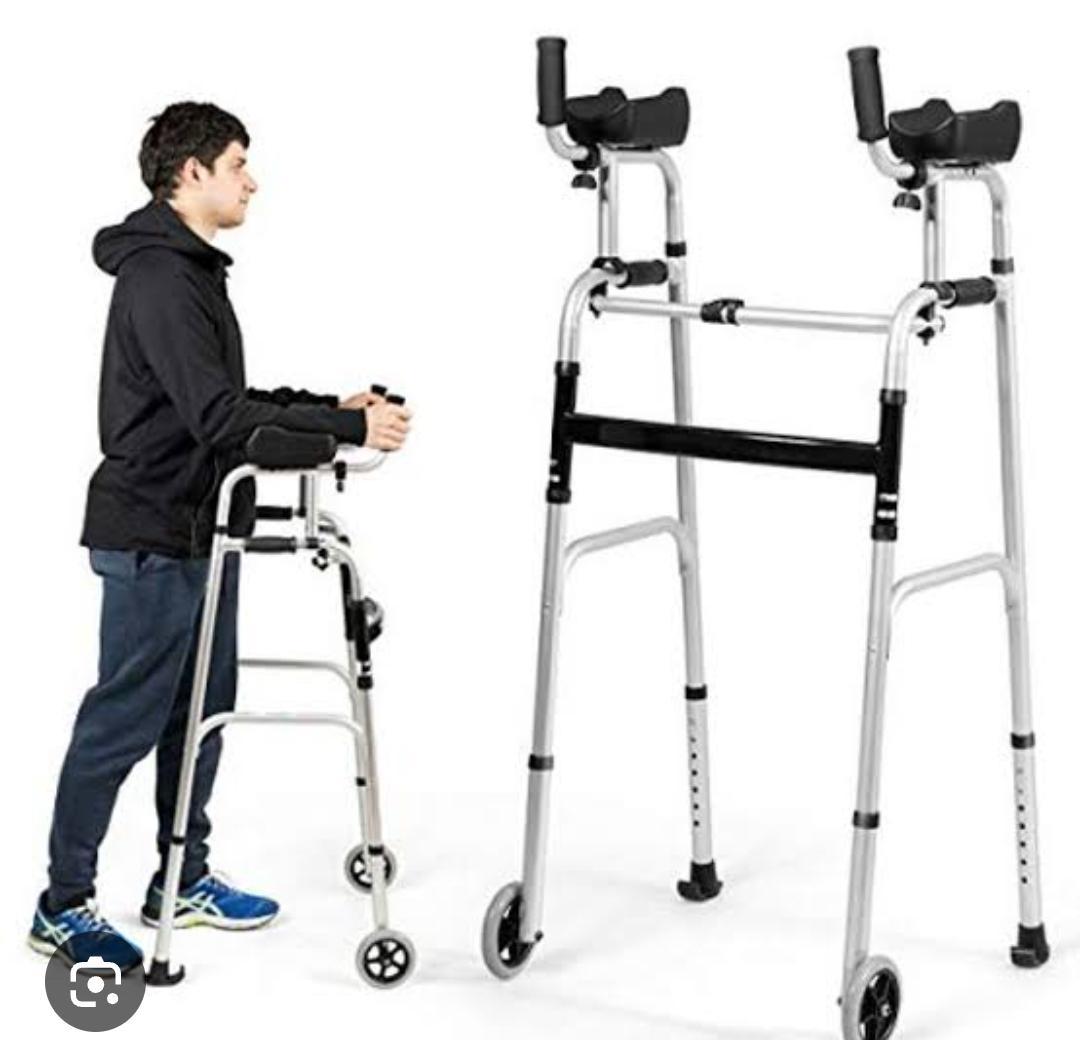 Walking aid with hand supports